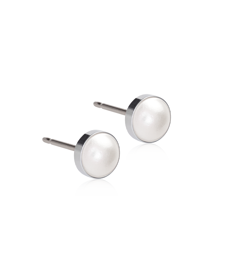 Pair of silver titanium 6mm stud earrings on a white background