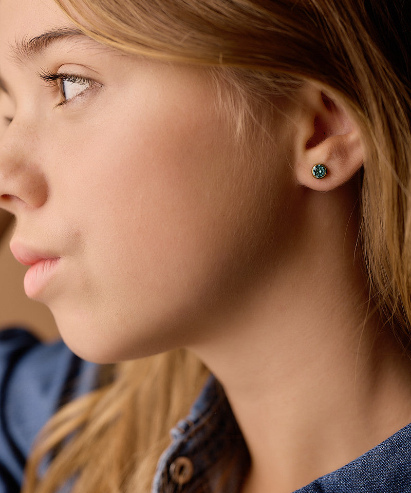 Model Wearing Golden Titanium 6mm Bezel Turquoise Earrings
