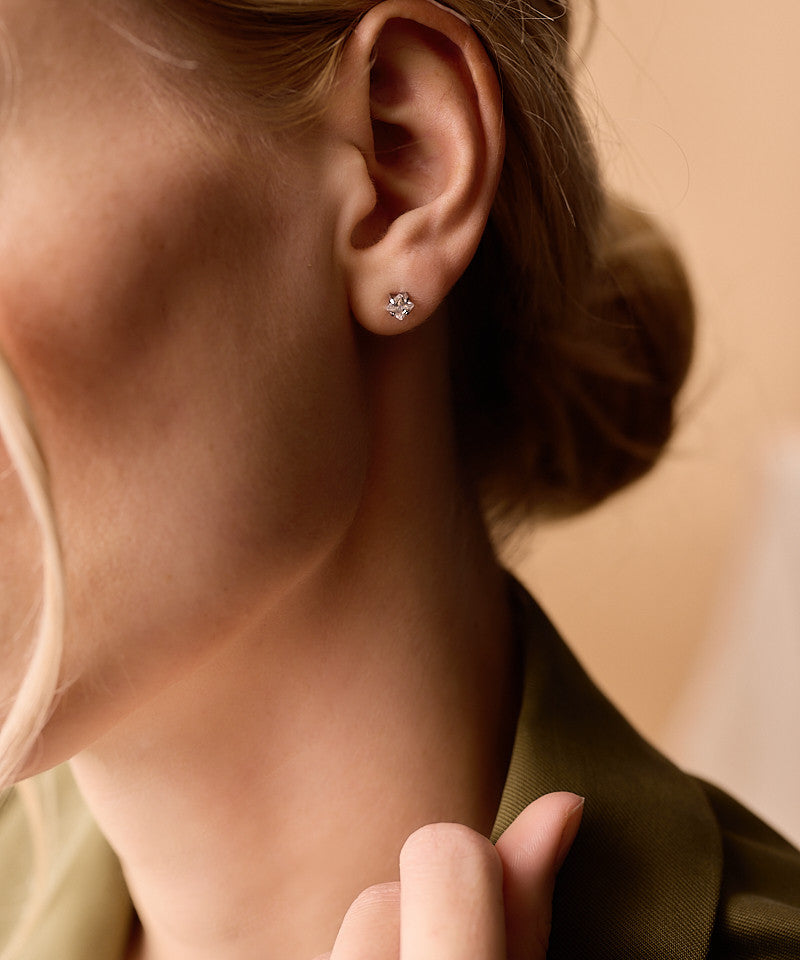 Model Wearing Silver Titanium Prong Set Edge 5mm CZ Earrings