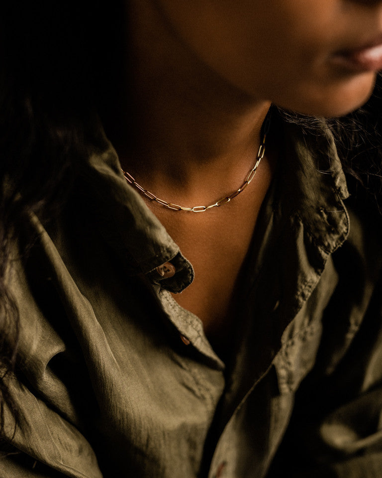 Link necklace on model in gold