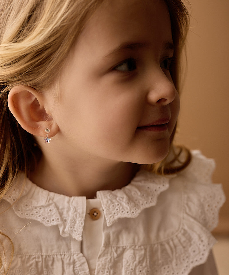 Lilac shimmer dangle star on model