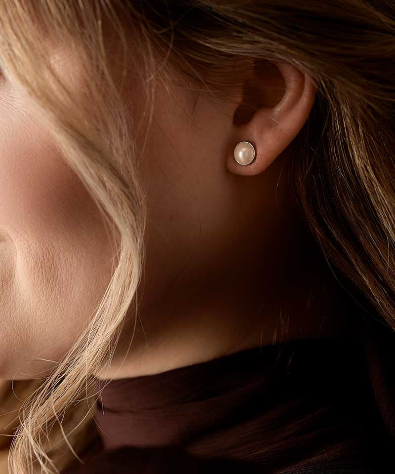 Golden Titanium Bezel White Pearl Earrings