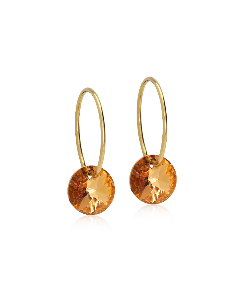 Gold hoop earrings with bronze gemstones on a white background