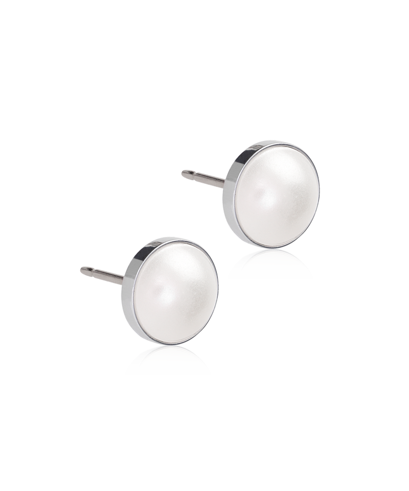 Pair of round nickel-free silver titanium stud pearl earrings on a white background