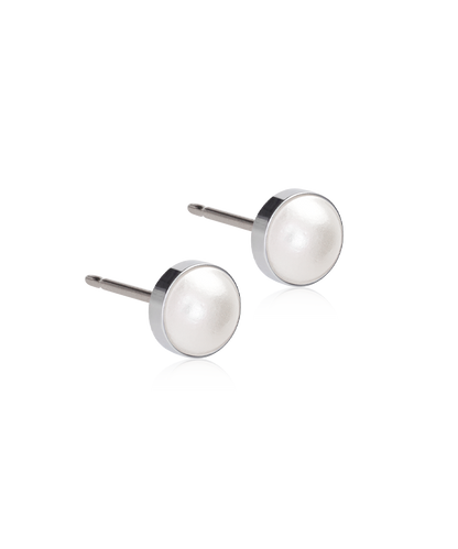 Pair of silver titanium 6mm stud earrings on a white background