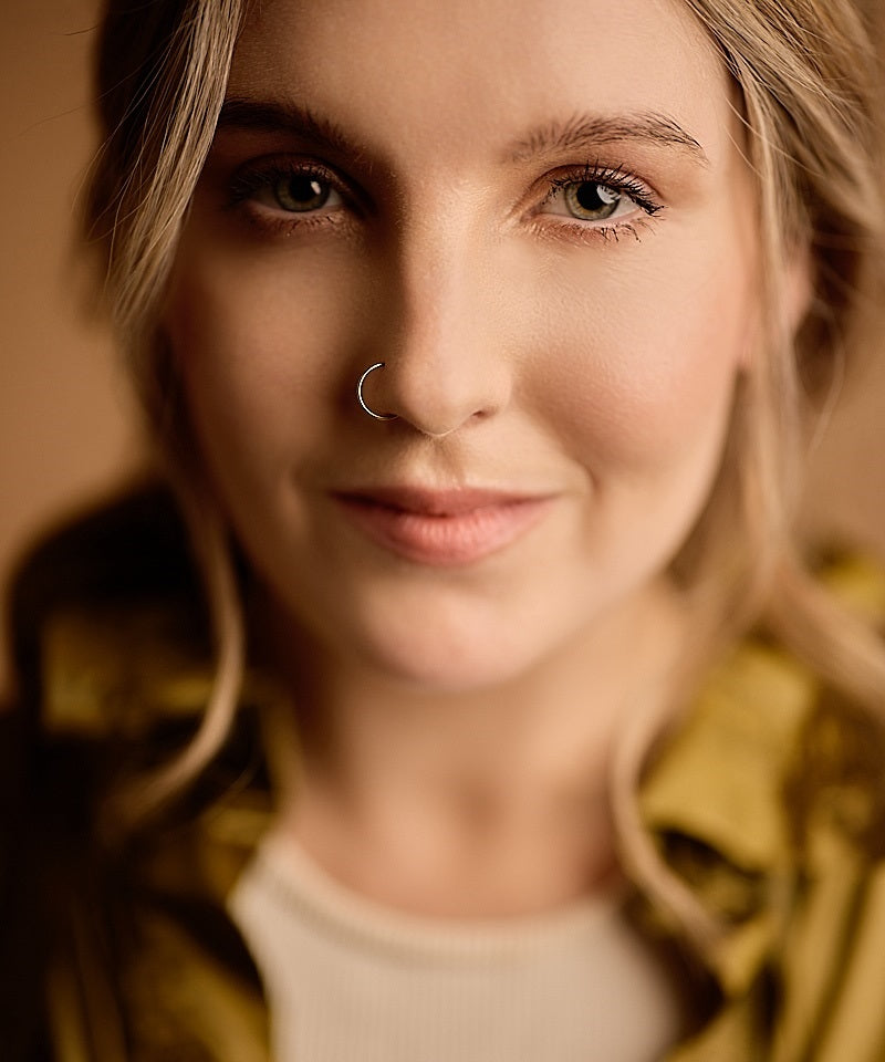 Model wearing 10mm Golden Titanium Nose Ring Right
