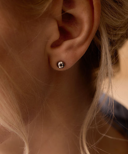 Model Wearing Silver Titanium 6mm Half Ball Earrings