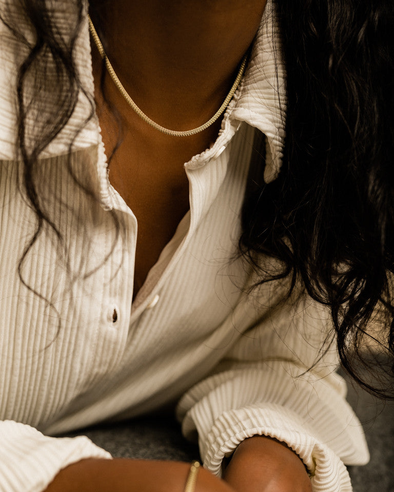 Round Mesh Necklace in gold on model