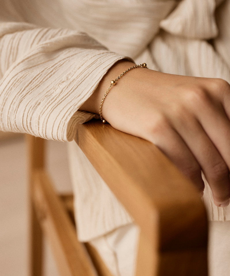 Model wearing Golden Grand Ball Bracelet