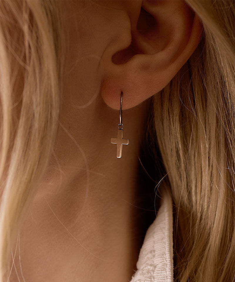 Cross Pendant Earrings on model