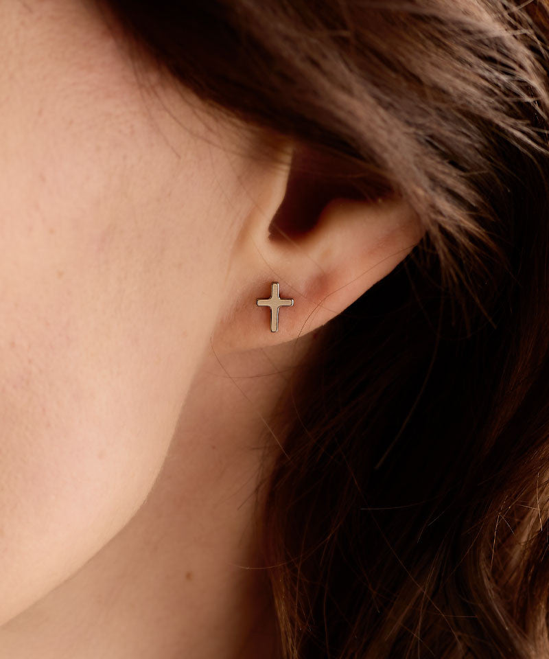 plain cross earrings on  models