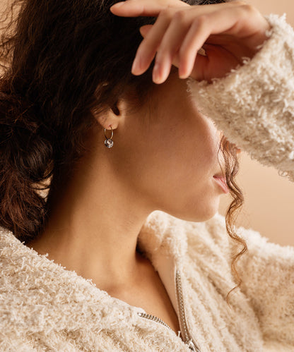 Golden Round 8mm Black Diamond Ear Ring on model