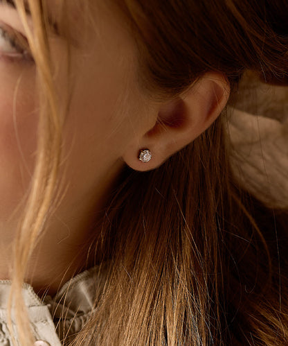 6mm Precious Prong Set earrings on model