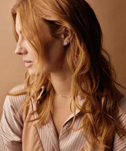 Nickel free prong set edge earrings on model