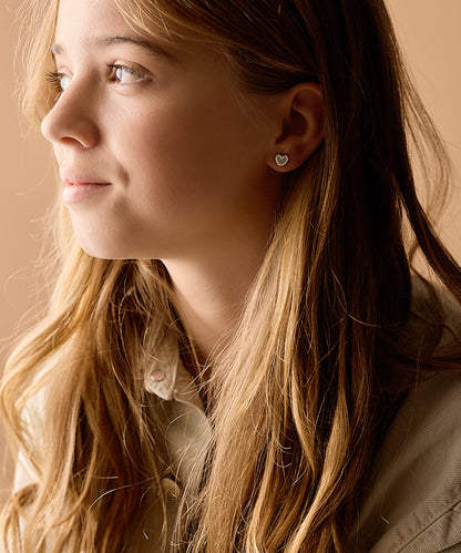 Hypoallergenic Brilliance Sweetheart earrings on model