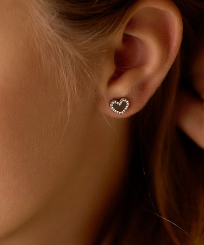 Hypoallergenic Brilliance Sweetheart earrings on model