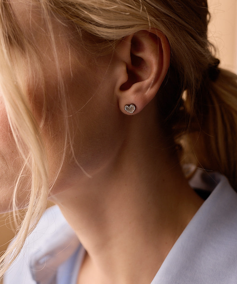 Hypoallergenic Brilliance Sweetheart earrings on model