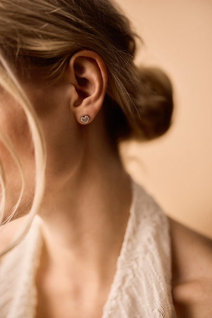 Hypoallergenic Brilliance Sweetheart earrings on model