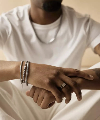 Hypoallergenic Grand twist bracelet stack in silver on male model